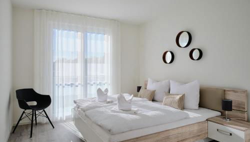 Apartment B 1 "Pine Hill Resort" Familienfreundlich mit eigenem Fahrradabteil & eingeschränktem Haffblick - Foto 2