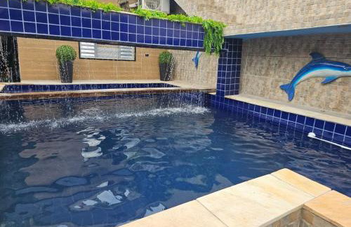 Casa com piscina na praia grande para temporada ou festas - Foto 18