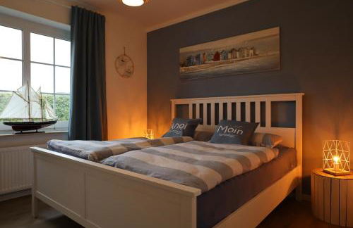 Nessmersiel, Renovierte Erdgeschosswohnung mit Garten, in Deichnähe, Wallbox, - Foto 6