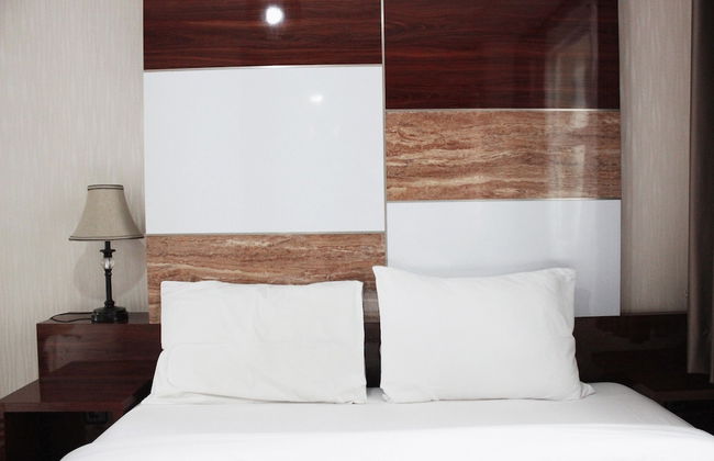 Fabulous 1BR Apartment @ Parahyangan Residence - Photo 2