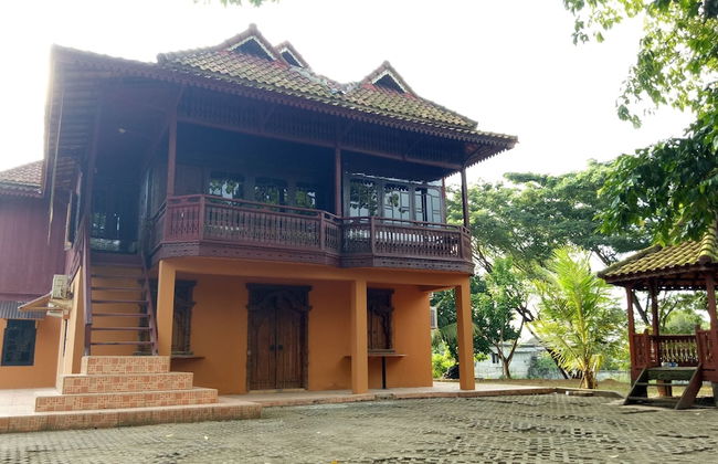 T-Rooms Homestay Bandara - Foto 1