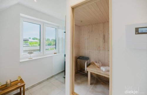 Lütt Diekje - Luxus-Haus mit Meerblick, Sauna & Kamin - Photo 19
