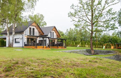 Brama Sanu - z prywatną linią brzegową Jeziora Solińskiego - pomosty - pontony - basen sezonowy - Foto 39