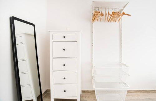 Charming Apartment With Vibrant Accents - Photo 10