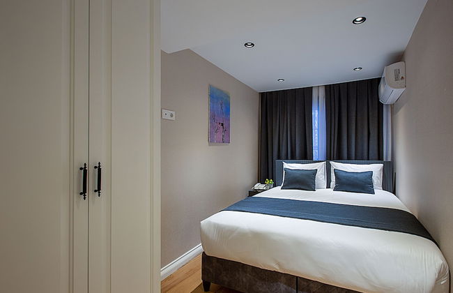 Moss Suites Hotel - Photo 11