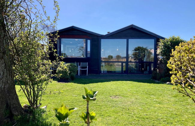 6 Pers House Marijke With Winter Garden and Direct Access to the Lauwersmeer - Foto 1