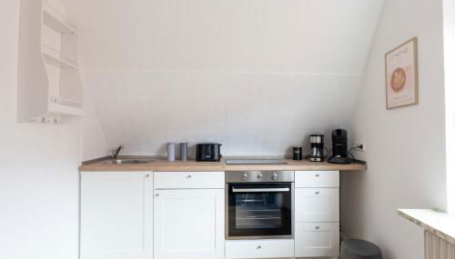 Kleines Studioapartment direkt am Marktplatz - Foto 3, stove, toaster