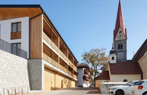 MESNERHOF CHALET - Ruhe, Rückzug & Südtiroler Charme mit kostenlosem Parken in der Tiefgarage - Photo 8