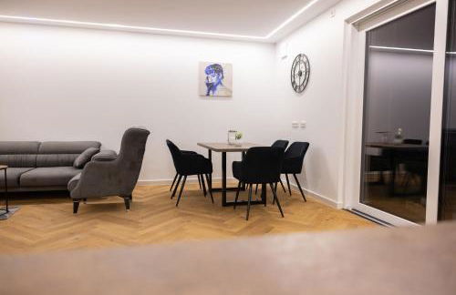 Neubau Apartment mit Kamin und Terrasse in Premium Lage Parkplatz inklusive - Foto 15