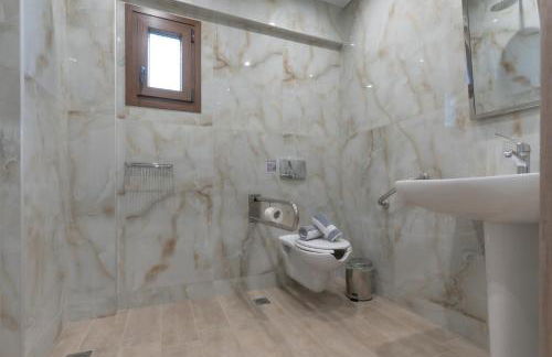 Sunshine Rooms and Suites - Foto 15