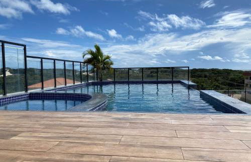 No Atalaia, Fort Poseidon rua do Atalho a 700 metros da praia do Atalaia, apartamento novo decorado, varanda, sala de estar e jantar, 02 suítes, 03 banheiros, lavanderia, cozinha, piscina, churrasqueira, salão de jogos, vista parcial das dunas e mar - Photo 60