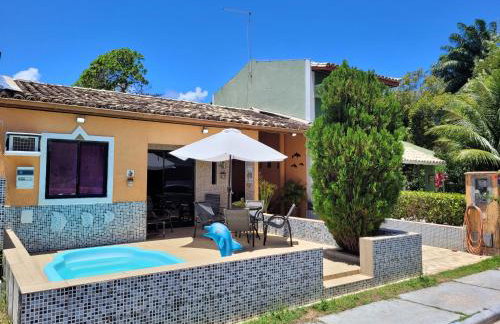 Casa 4 quartos, com piscina no Condominio Sol Marina Jacuipe com acesso a praia e ao rio de Jacuipe - Foto 1