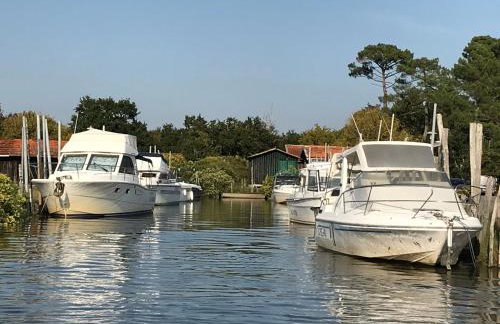 Aux pieds des plages, du port, de la piste cyclable et des commerces de proximité, un studio au dernier étage avec une vue panoramique sur le Bassin d'Arcachon, entièrement rénové, dans une résidence avec piscine - Foto 35