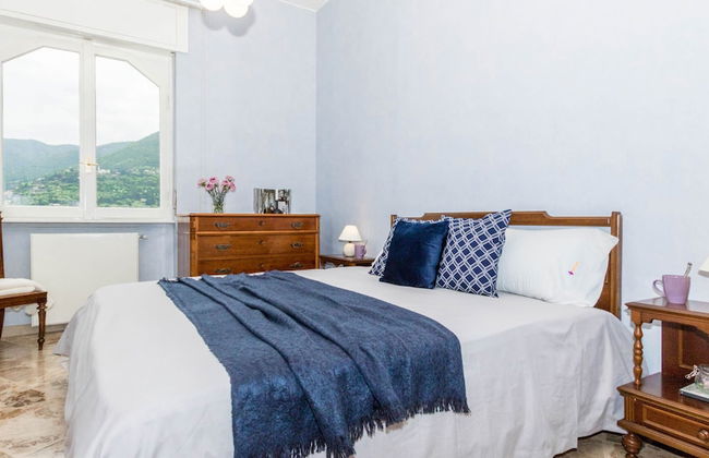 JOIVY Garden Oasis: 1BR Apt w/ Balcony & Parking - Foto 3