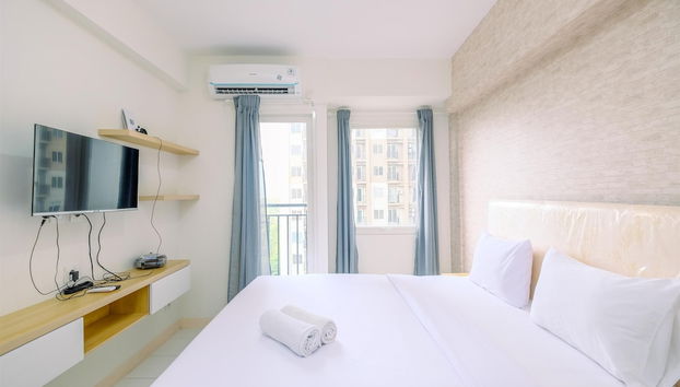 Nice and Warm Studio at Podomoro Golf View Apartment - Foto 5, Habitación