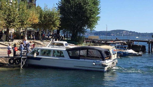 Boarding the hop on hop off boat in Stresa