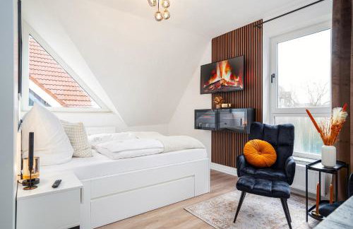 NEU! Modernes Apartment am Larrelter Tief - Balkon, Privatparkplatz & FIRE TV! - Photo 9