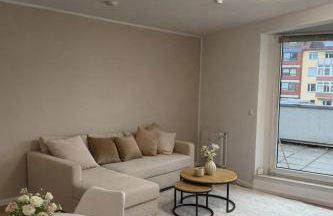 Zentrales Apartment mit Dachterrasse und Parkplatz - Foto 1