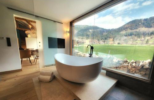 stylische Alpenlounge mit Pool, Blockhaus-Sauna und Jacuzzi für bis zu 12 Personen - Foto 5