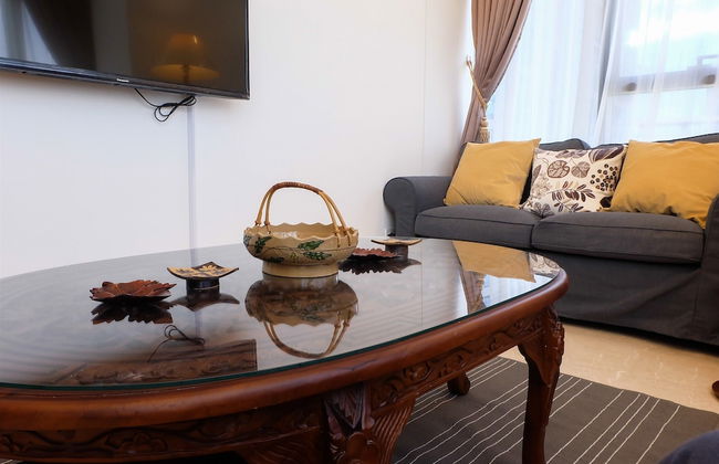 Comfy 2BR L'Avenue Apartment - Photo 11