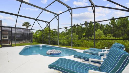 Themed 4BR house pool game room 10 min Disney - Foto 1