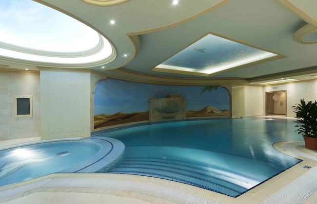 Magnum Hotel & Suites West Bay - Foto 14