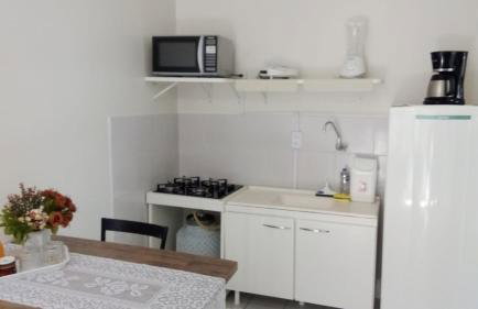 Apto 10: sala/cozinha,1quarto(ar e 2 camas)c/garag - Foto 1