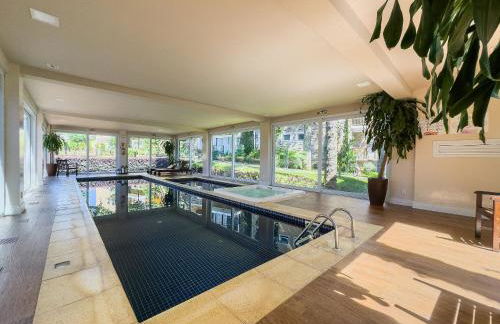 Casa de Pedra 2 Suítes c/ Piscina by Achei Gramado - Photo 32