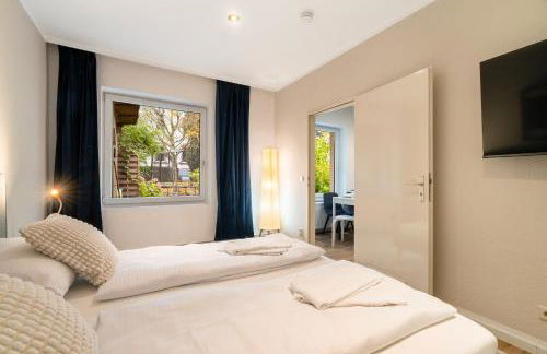 Cosy Remise Apartment Berlin Reinickendorf - Foto 1