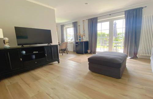 Nessmersiel, Renovierte Erdgeschosswohnung mit Garten, in Deichnähe, Wallbox, - Foto 3