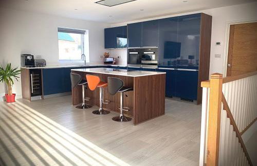 Relax in style at my stunning Holywell Beach home - Foto 1