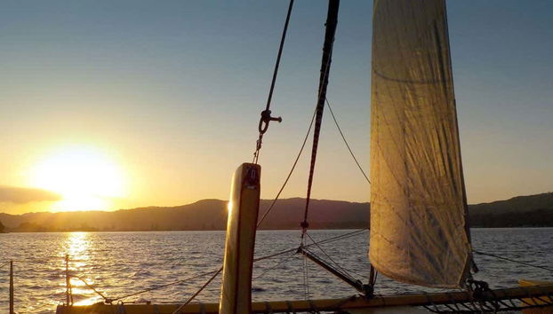 Admiring a unique sunset from the catamaran