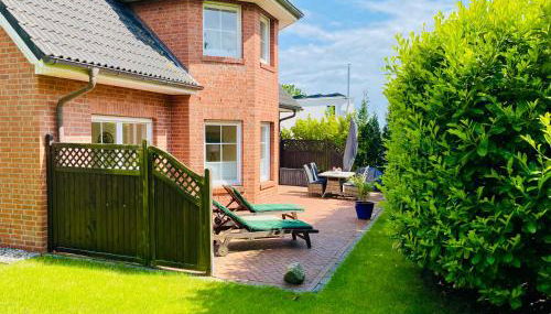 FeWo SONNENDECK Familien-strandnah-Garten-Hunde-Sport-und Schwimmbadnah-HansaPark - Foto 2, Garden, sunbed, Garden view