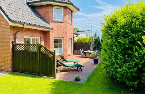 FeWo SONNENDECK Familien-strandnah-Garten-Hunde-Sport-und Schwimmbadnah-HansaPark - Foto 2
