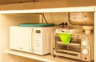 Casa d'Aroeira Residencial Boutique - Centro de Juqueí - Perto de Tudo - 2 quadras do Mar - Serviço de Praia - Roupa de Cama 600 fios algodão Egípcio - Tudo Novo - Estacionamento Interno - Cozinha - Consulte unidades com Ofurô Hidro e Cromoterapia - Foto 42