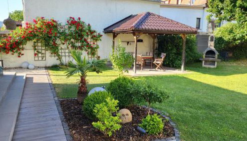 Apartments am Saalebogen mit Gartenterrasse, Grillkamin und freie Parkplätze - Foto 4, Garden