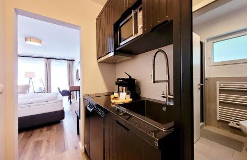 Moderne 1 Zimmer Ferienwohnung mit Sonnenterrasse und Parkplatz, in ruhiger Lage, nur wenige Gehminuten zum Ostsee Sandstrand - Foto 5