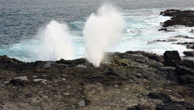 Waves crashing at Española Island