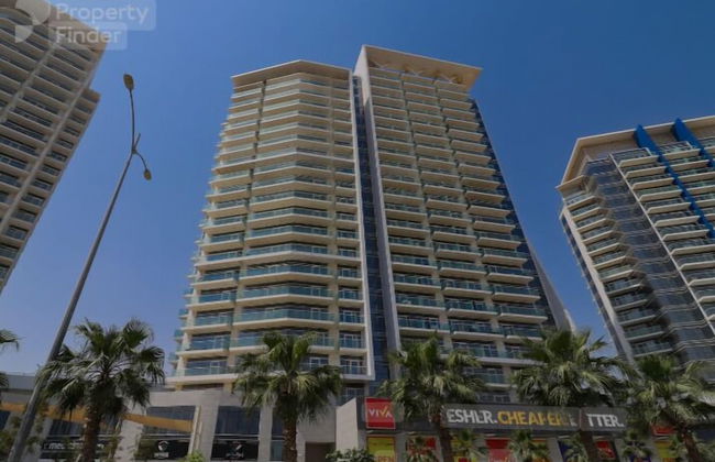 Nasma Holiday Homes - DAMAC Hills Artesia Tower C - Photo 9