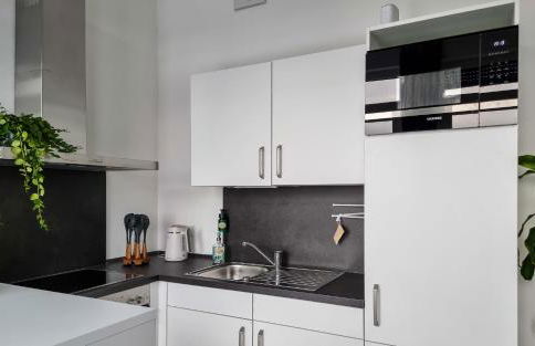 WiLUKA Penthouse mit großer Dachterasse -highspeed Wifi- 24Std Check-In -nachhaltig eingerichtet- Netflix - Photo 20