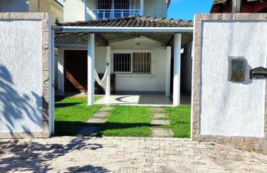 Casa Piscina em Condomínio 5min Praia ITACOATIARA. - Foto 4