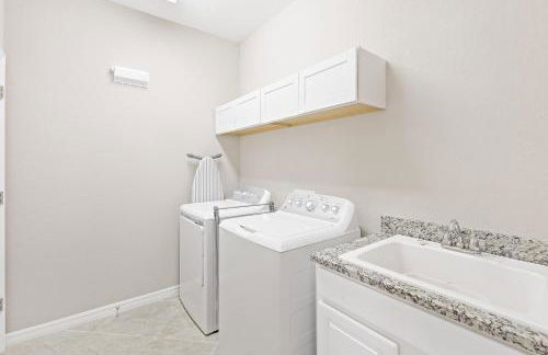 Modern waterfront home in Artesia with pool/gym - Photo 23