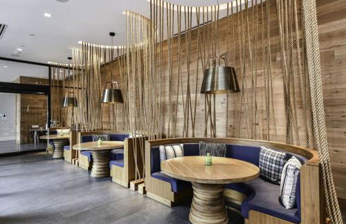 Comfy 2BR Oasis with Scenic Rooftop & Gym - Photo 34