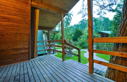 Ośrodek Wypoczynkowy Puszczyk Wolnostojące Domki Sosnowe z zadaszonym tarasem - Foto 13