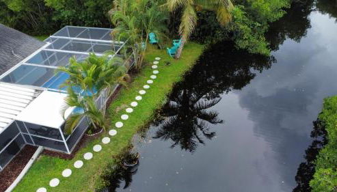 Bring Snacks and Relax! Waterfront, Heated pool, Cribs, Pets, Rods, BBQ - Foto 4, Garden, Garden view