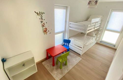 Strahlende Erdgeschoss-Wohnung im Neubau nähe Legoland - Foto 3