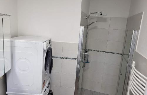 Einzelwohnung im EG mit Terrasse und AC - Foto 9