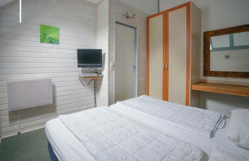 Ferienhaus "Gestiefelter Kater" am See im Bergland - Photo 14