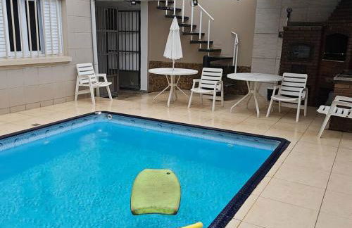Belíssima Casa a Beira Mar com Piscina Aquecida Cobrado a Parte, 5 Quartos com Ar Condicionado, Amplo Salão de Jogos com Mesas de Bilhar e Pebolim, Amplo Espaço Externo com Churrasqueira em Deck Gourmet Coberto frente a Piscina,Tudo isso á Beira Mar - Photo 22