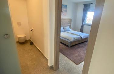 Apartmani Kumenat - Photo 11